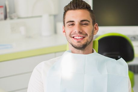 Smiling man during dental checkup