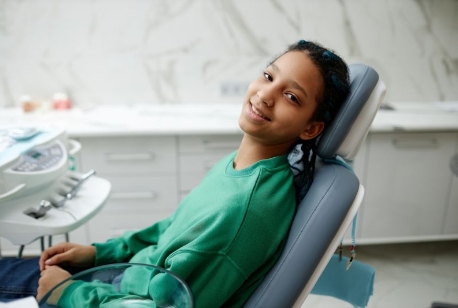 Relaxed teenage dental patient in treatment chair