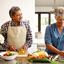 older couple preparing food