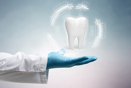 Dentist holding a hologram of a tooth
