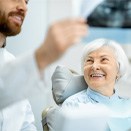 patient getting dental implants in Loveland      