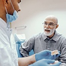 man at a dental implant consultation