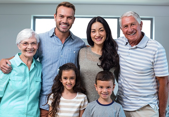 Three generations of family with healthy smiles thanks to preventive dentistry