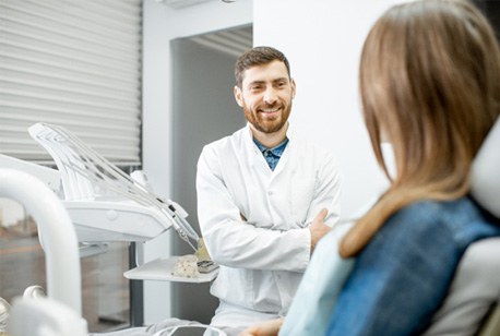 dentist talking to patient 