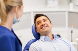 Man talking to his dentist